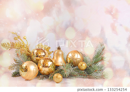 Festive winter greeting card and banner on the screen, Christmas decorations on spruce snowy branches, Christmas and New Year background with lights and decorations, layout for design, Happy New Year. Festive winter greeting card and banner on the screen, Christmas decorations on spruce snowy branches, Christmas and New Year background with lights and decorations, layout for design, Happy New Year. 133254254