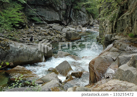 Stream fishing in the boulder-strewn Yazaru Valley, upstream of Shosenkyo Gorge 133255472