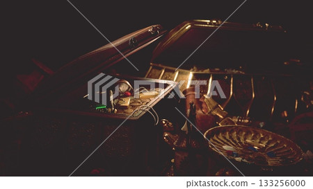 A treasure chest partially open, showcasing shimmering gold coins, ancient artifacts, and mysterious relics. The dim light casts shadows, highlighting the allure of forgotten history. 133256000
