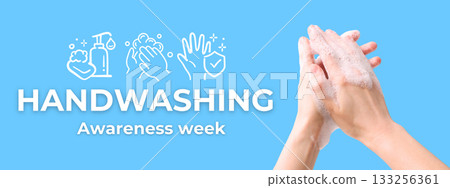 Soapy hands lathering against a blue backdrop Soapy hands lathering against a blue backdrop 133256361