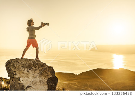 Woman with camera take travel photo Woman with camera take travel photo 133256458