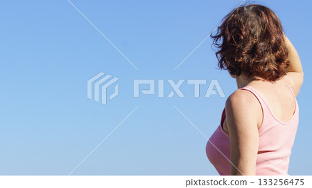 Woman against sky enjoy landscape 133256475