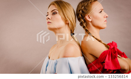 Two suspicious women 133256814