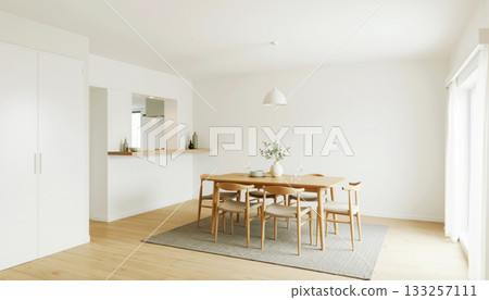 A simple and modern living room with a Scandinavian-style dining table and counter. Housing materials 133257111