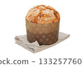 Easter sweet pastry on a linen napkin. Isolated on white background. Panettone and sweet religion bread. Religion traditions. Home decor and cake. 133257760