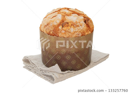 Easter sweet pastry on a linen napkin. Isolated on white background. Panettone and sweet religion bread. Religion traditions. Home decor and cake. Easter sweet pastry on a linen napkin. Isolated on white background. Panettone and sweet religion bread. Religion traditions. Home decor and cake. 133257760
