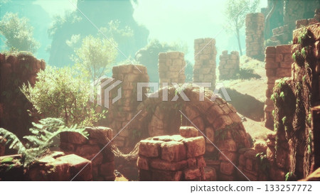 Majestic ruins stand tall under the warm sunlight, embraced by green foliage. Nature reclaims this forgotten place, creating a stunning scene of beauty and history in a serene landscape. 133257772