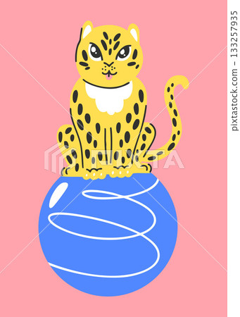Spotted leopard sitting on a tumbling ball, circus performance with wild cat on pink background 133257935
