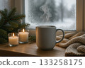 Enjoying a warm cup of coffee while cozying up by the snowy window in winter 133258175