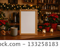 Cozy cafe setting with empty frame, warm drinks, and festive decorations during the holiday season 133258183