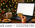 Shopping online during the holiday season with cookies and a warm drink 133258190