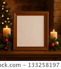 Cozy holiday setting with empty frame and candles on a wooden table 133258197