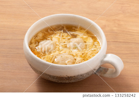 Chicken meatballs and egg soup 133258242