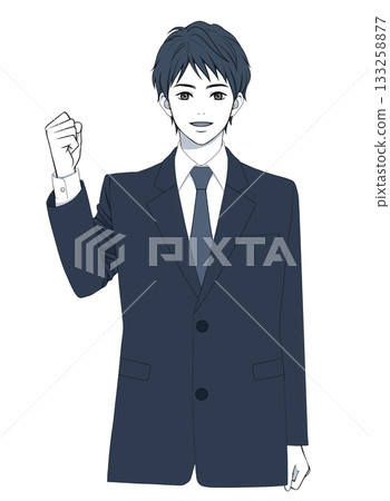 A young man in a suit smiling and pumping his fist A young man in a suit smiling and pumping his fist 133258877