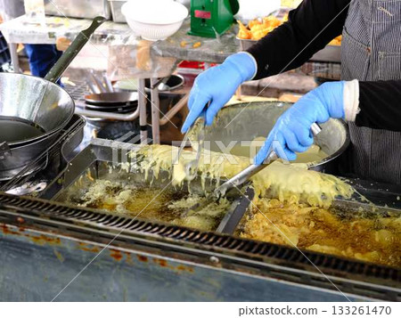 Potato tempura sold at the Sunday market in Kochi Prefecture 133261470