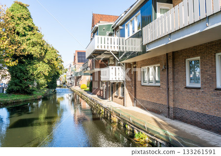 Canal water Houses street in Volendam Netherlands Canal water Houses street in Volendam Netherlands 133261591
