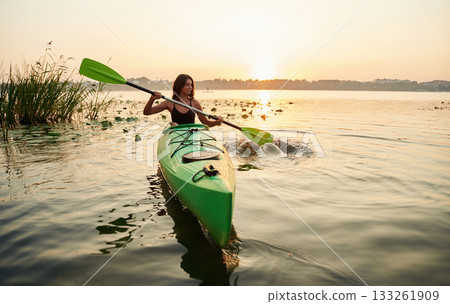 Leisure, wellness conception. Young woman is with the sup board on the lake 133261909