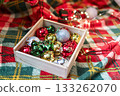 Decorations for Christmas Tree , silver and red Balls Garlands Lights on red green Background Holidays Home Decor toy 133262070