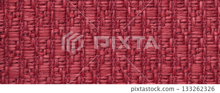 Dark red woven textile macro texture background. Knitted wine fabric pattern for material design and backdrop Dark red woven textile macro texture background. Knitted wine fabric pattern for material design and backdrop 133262326