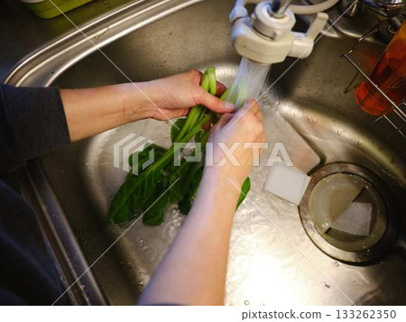 Kitchen cooking vegetables cutting woman hand tags Kitchen cooking vegetables cutting woman hand tags 133262350