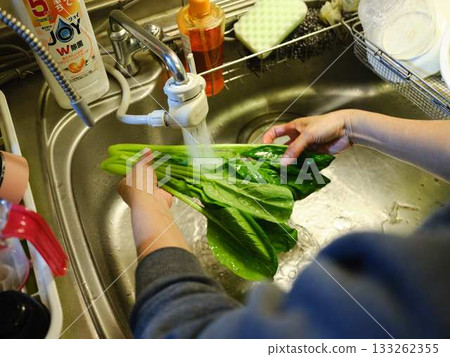 Kitchen cooking vegetables cutting woman hand tags Kitchen cooking vegetables cutting woman hand tags 133262355