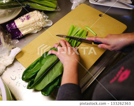 Kitchen cooking vegetables cutting woman hand tags Kitchen cooking vegetables cutting woman hand tags 133262363