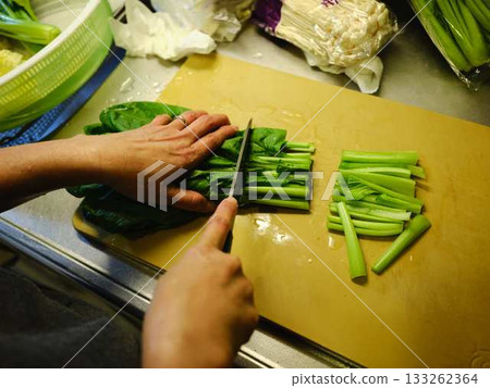 Kitchen cooking vegetables cutting woman hand tags 133262364