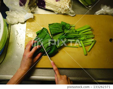 Kitchen cooking vegetables cutting woman hand tags Kitchen cooking vegetables cutting woman hand tags 133262371