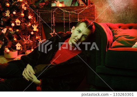 Festive holiday scene, Cozy room with candles and holiday decor 133263301