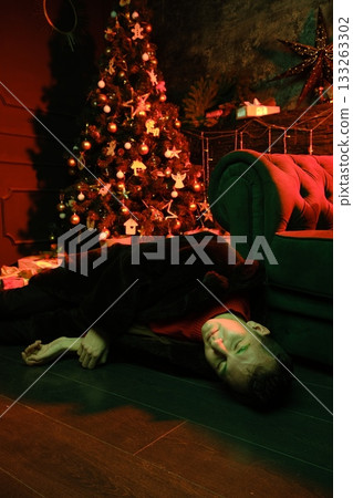 Exhausted performer after gala resting on tufted couch Exhausted performer after gala resting on tufted couch 133263302