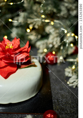 Festively Decorated Dessert Featuring a Vibrant Flower Centerpiece Perfect for Holiday Celebrations and Events Festively Decorated Dessert Featuring a Vibrant Flower Centerpiece Perfect for Holiday Celebrations and Events 133263890