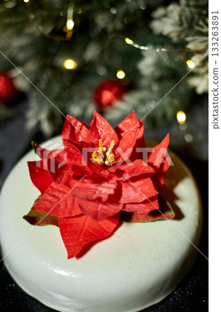 Festively Decorated Dessert Featuring a Vibrant Flower Centerpiece Perfect for Holiday Celebrations and Events 133263891