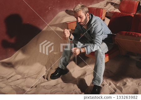 Person with vintage costume gestures at empty performance space 133263982