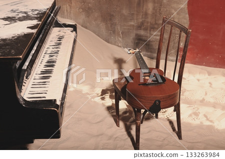 Chilly scene with abandoned acoustic instruments near sunlit courtyard Chilly scene with abandoned acoustic instruments near sunlit courtyard 133263984