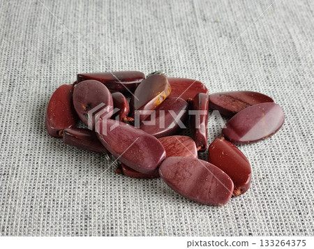 A stacked red jasper necklace. The wide, hand-cut natural stone is traditional Ukrainian ethnic necklace 133264375