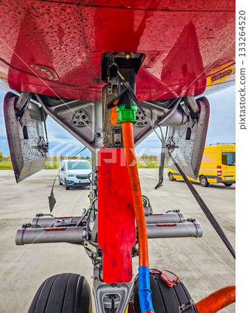 Aircraft Landing Gear Bay with Ground Power Unit Cable Aircraft Landing Gear Bay with Ground Power Unit Cable 133264520