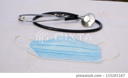 Phonendoscope with medical bandage on the table. 133265167