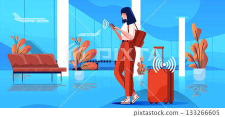 Woman airport traveler using smartphone smart luggage wireless connection modern terminal interior plants airplanes waiting area 133266605