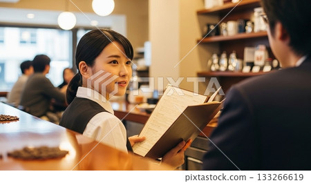 A woman working in a cafe 133266619