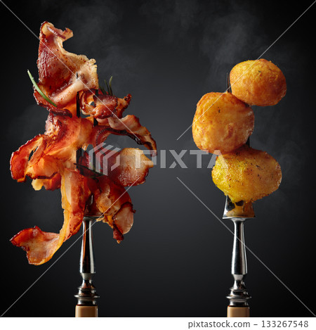 Roasted potatoes with bacon. 133267548