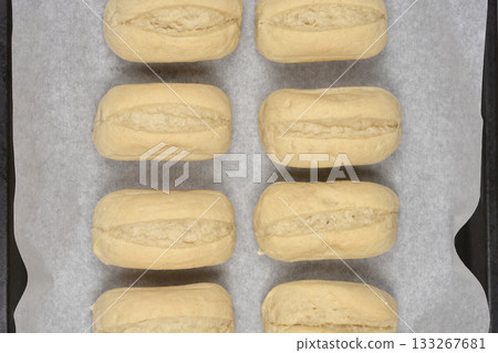 Eight raw bread rolls Eight raw bread rolls 133267681