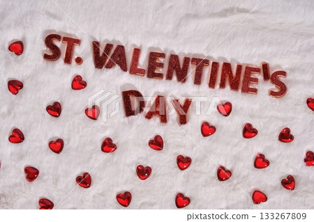 Festive St. Valentine's Day background on a white plush background with hearts. Festive St. Valentine's Day background on a white plush background with hearts. 133267809