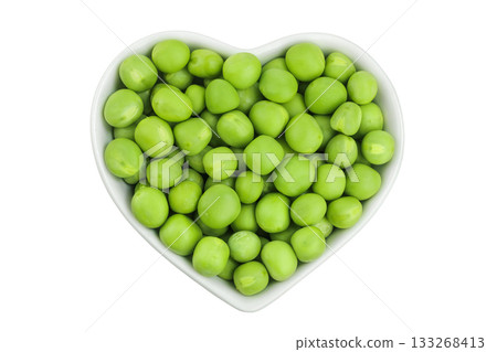 Fresh green peas in ceramic bowl isolated on white background. Top view. Flat lay 133268413