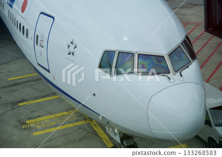 Frankfurt, Germany, June 10, 2019: Long Haul Aircraft at the Gate Viewed from the Airport Lounge Frankfurt, Germany, June 10, 2019: Long Haul Aircraft at the Gate Viewed from the Airport Lounge 133268583