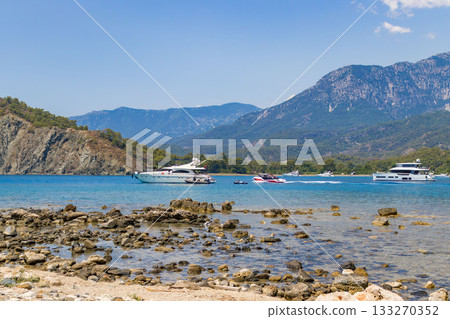 Phaselis harbour. Phaselis beach and Bey Mountains on the background in Antalya Turkey. Beaches of Turkey. Phaselis harbour. Phaselis beach and Bey Mountains on the background in Antalya Turkey. Beaches of Turkey. 133270352