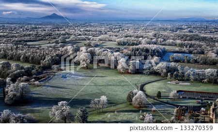 Aerial view of winter snow covered forest landscape. Drone photography collection. Ireland, croagh Patrick view Aerial view of winter snow covered forest landscape. Drone photography collection. Ireland, croagh Patrick view 133270359