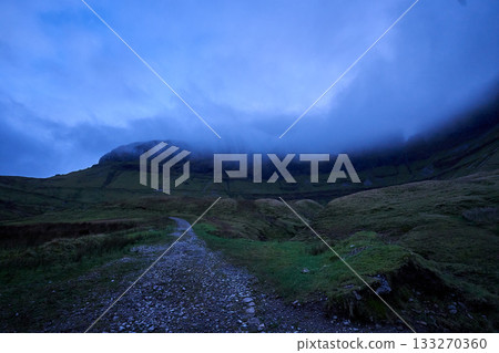 rough mountain bike trail in summer 133270360