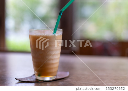 Iced cafe au lait in a glass 133270652