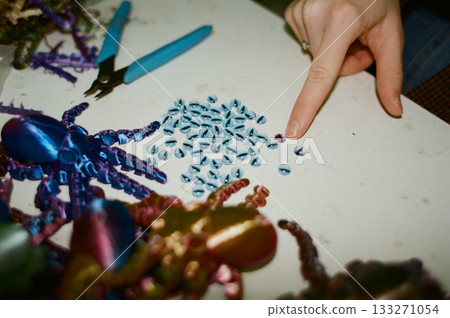 production of three-dimensional plastic toys at factory. 3D printers, modern technologies. production of three-dimensional plastic toys at factory. 3D printers, modern technologies. 133271054