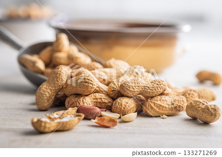 Peanuts in shell. Groundnuts on kitchen table. 133271269